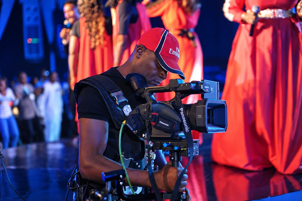 Cosmic Media camera and production crew working at an event